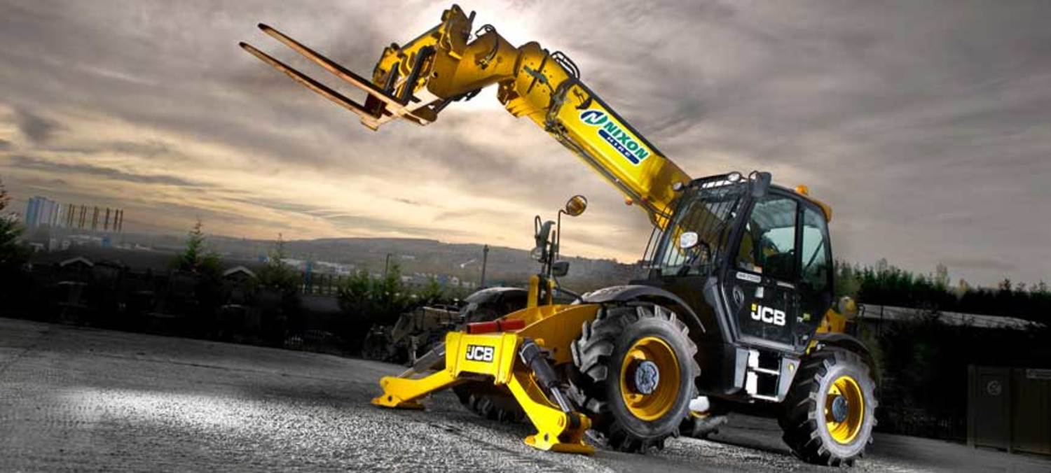 Plant and Tool Hire Sub Title Spotlight Lit JCB Telehandler On Site
